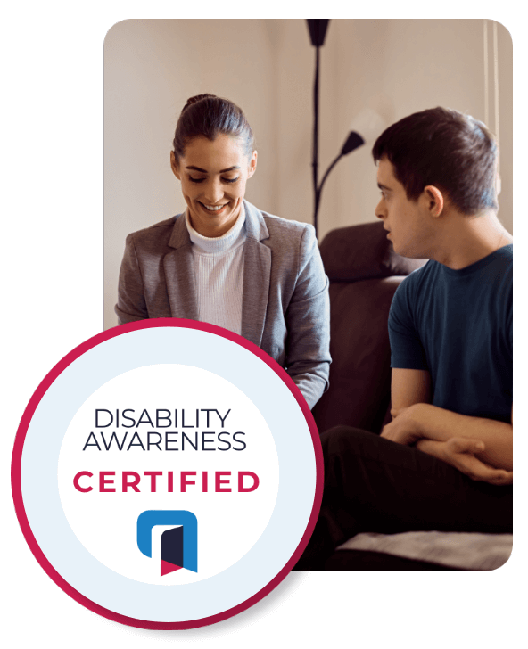  Photo of professional assisting a young man. Over the image is a certification badge reading ‘Disability Awareness Certified’